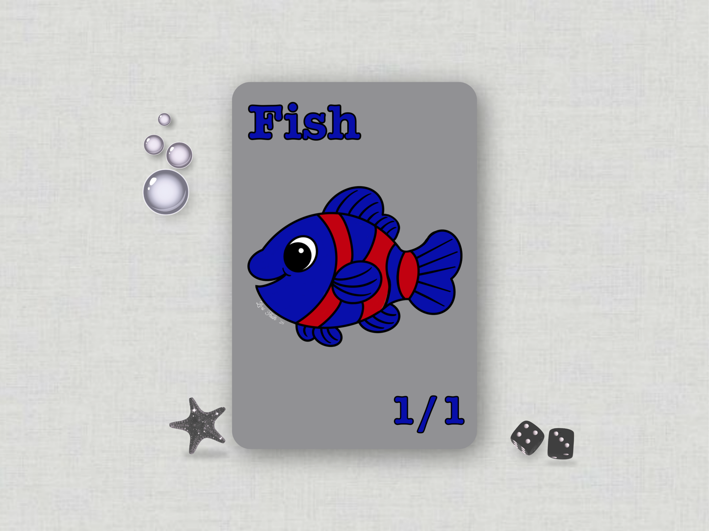 Front face of a custom MTG 1/1 Fish game token featuring a blue and red chibi clownfish on a solid gray background hand-drawn by Lori Faith.
