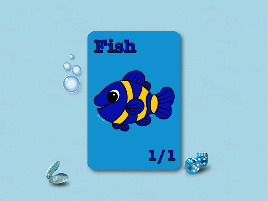 Front face of a custom MTG 1/1 Fish game token featuring a yellow and blue chibi clownfish hand-drawn by Lori Faith on Reflections Matte Art Cardstock.