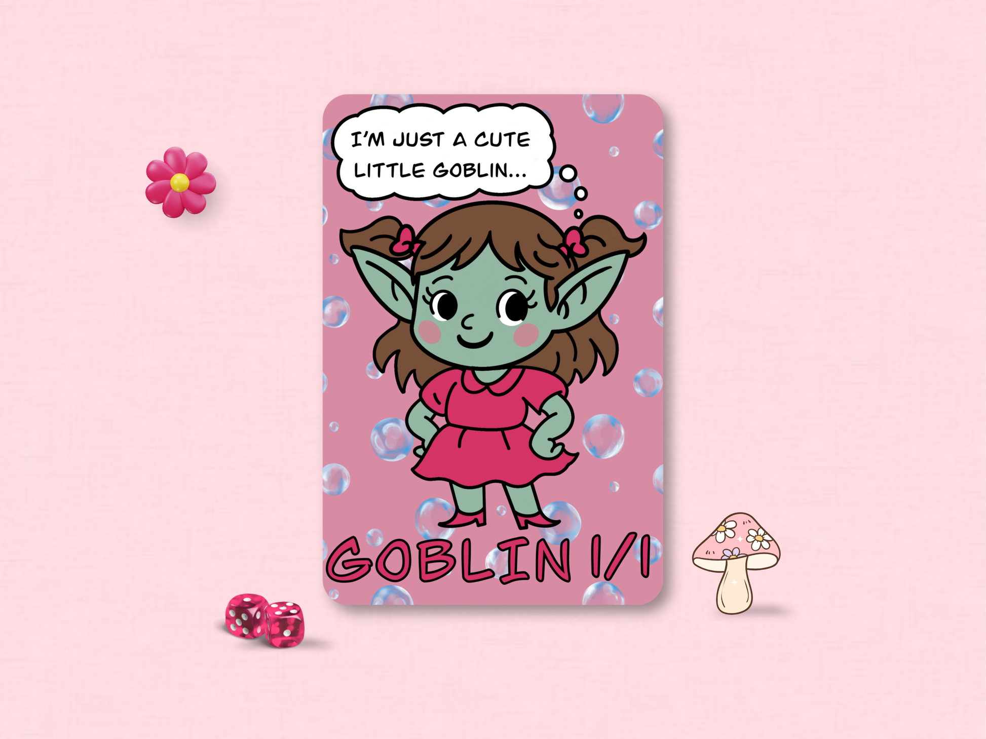 Front face of a custom MTG 1/1 Goblin game token featuring a green chibi goblin girl in a pink dress hand-drawn by Lori Faith on a bubble background.